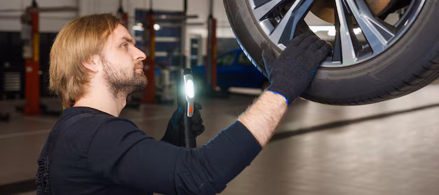 inspection-by-professional-car-mechanic-tire-wear-car